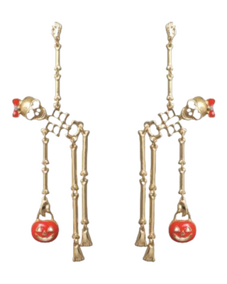 Gold skeleton dangling earring, holding a jack o lantern.