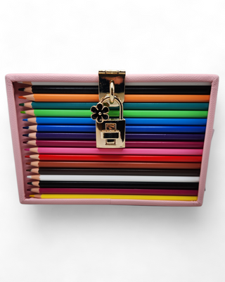 Vibrant crossbody bag featuring real colored pencils arranged vertically, with a compact size and an adjustable strap, displayed on a clean, white background