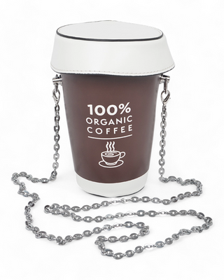 A coffee cup-shaped crossbody bag with a brown base and "100% Organic Coffee" text, a white lid design, and a silver metallic chain strap.