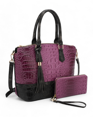 A croc-embossed satchel with matching wallet, featuring tassel detailing and a structured silhouette.