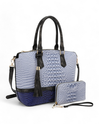 A croc-embossed satchel with matching wallet, featuring tassel detailing and a structured silhouette.