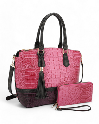 A croc-embossed satchel with matching wallet, featuring tassel detailing and a structured silhouette.