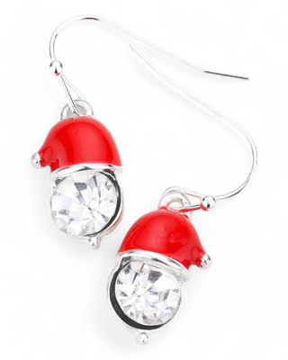 A pair of dangle earrings with clear round crystals adorned with red Santa hats on top.