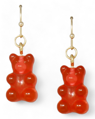 A pair of red gummy bear earrings with gold hooks