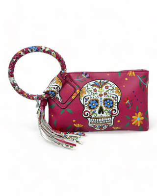 Fuschia clutch wristlet with Day of the Dead design