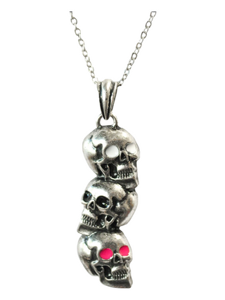 A triple skull pendant necklace with three vertically stacked skulls, featuring white, dark, and red eyes, on a silver chain.