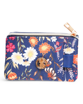 A compact floral-patterned wallet with a clear ID slot, zippered closure, and key ring attachment, designed for everyday convenience and style.