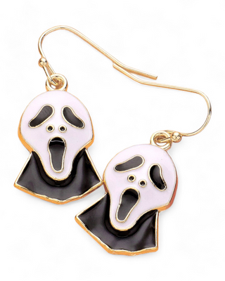 arrings depicting the Scream mask in white and black enamel, with a gold outline. The earrings show the mask's distinct shocked expression