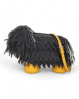 Adorable crossbody bag designed to look like a shaggy dog, featuring a furry exterior, cute facial details, and an adjustable strap, displayed on a clean, white background