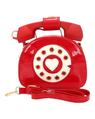 Red vinyl telephone shaped handbag/crossbody bag, side view