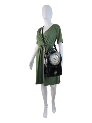 Black crossbody with a working clock face on a mannequin